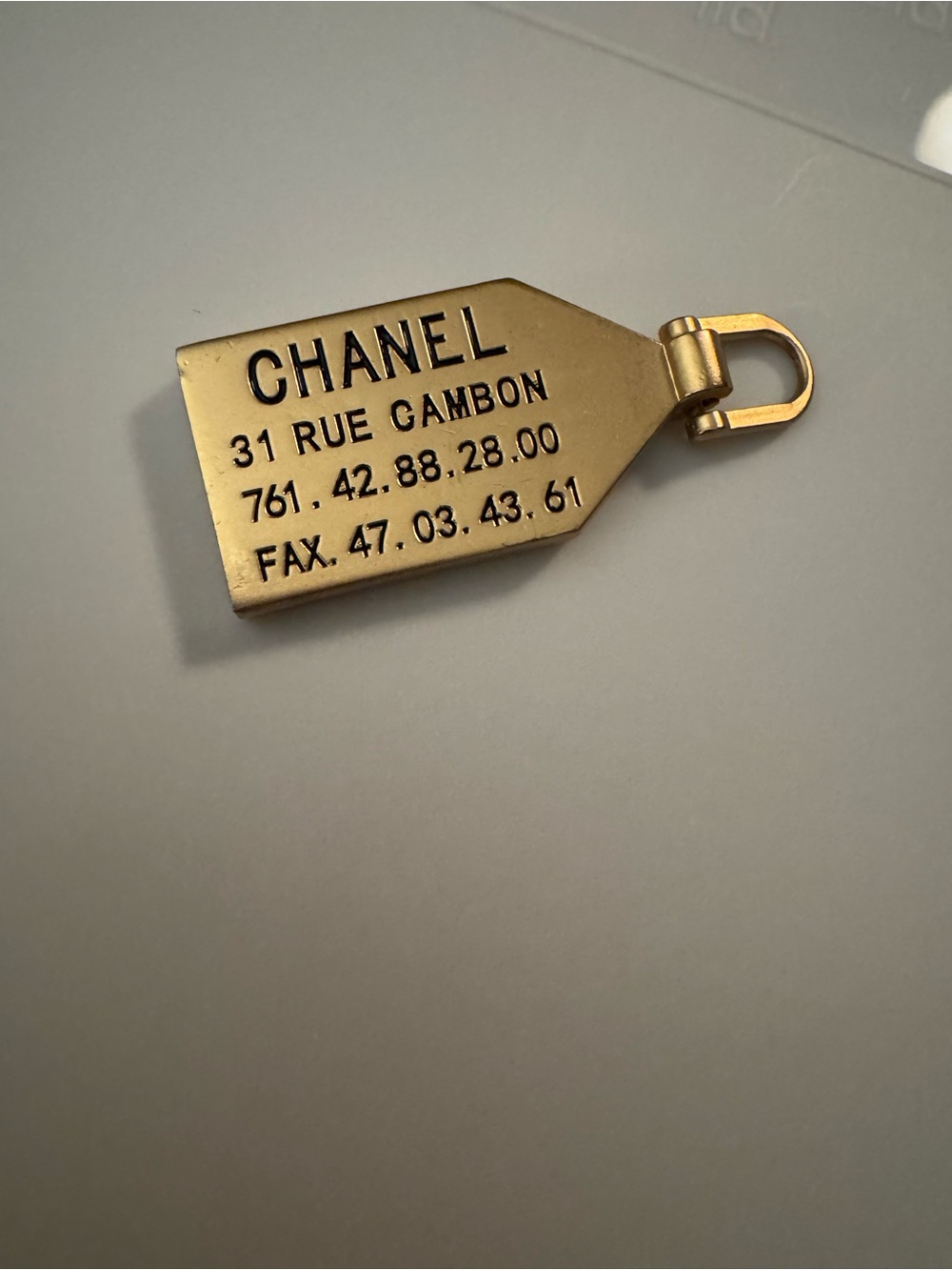 Gold-tone cc up cycles pendant